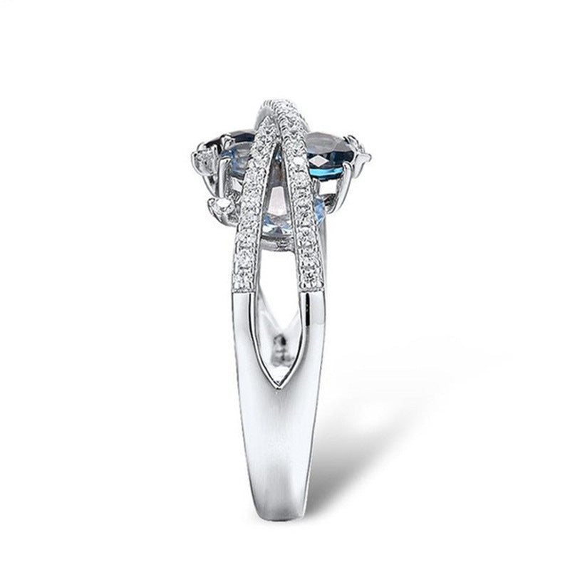 Fashion X-shaped Hollow Jeweled Blue Zircon Rings