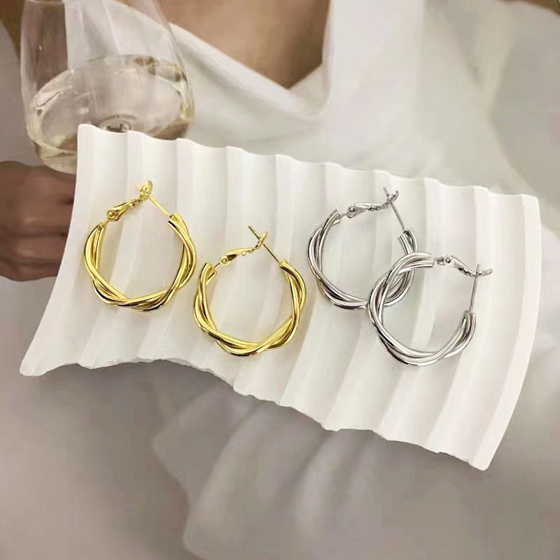 Women's Simple Twist Temperament Entry Lux High Earrings