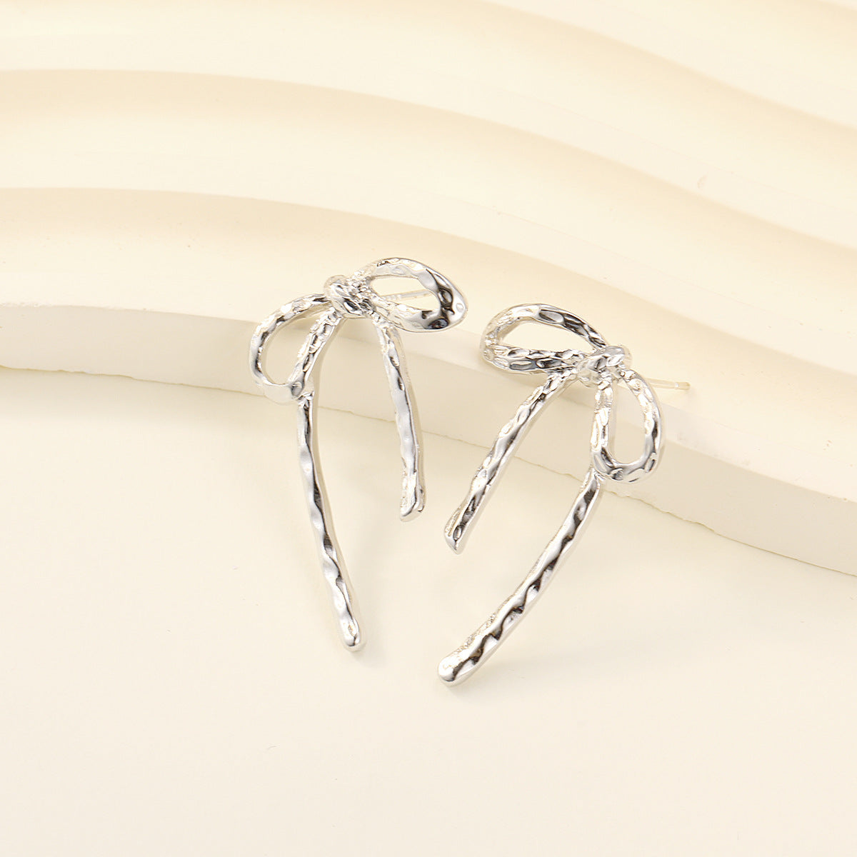 Women's Irregular Metal Bow Design Sense Niche Earrings