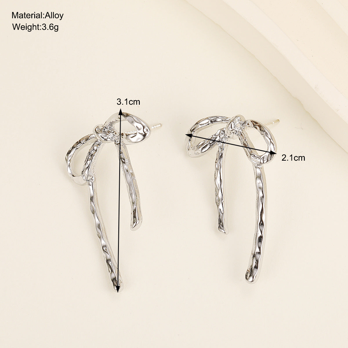 Women's Irregular Metal Bow Design Sense Niche Earrings