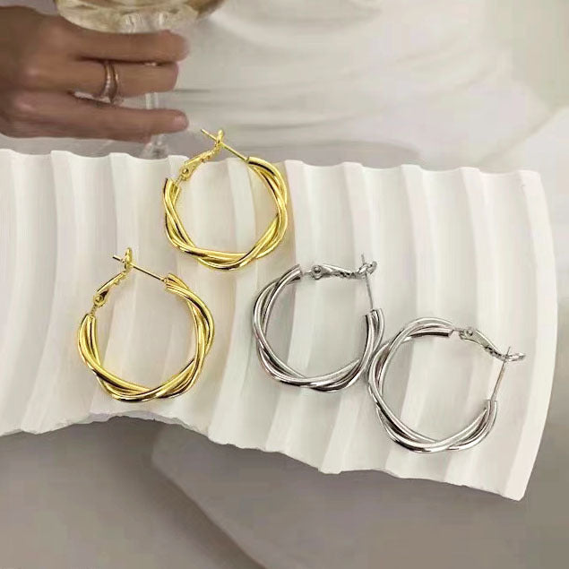 Women's Simple Twist Temperament Entry Lux High Earrings