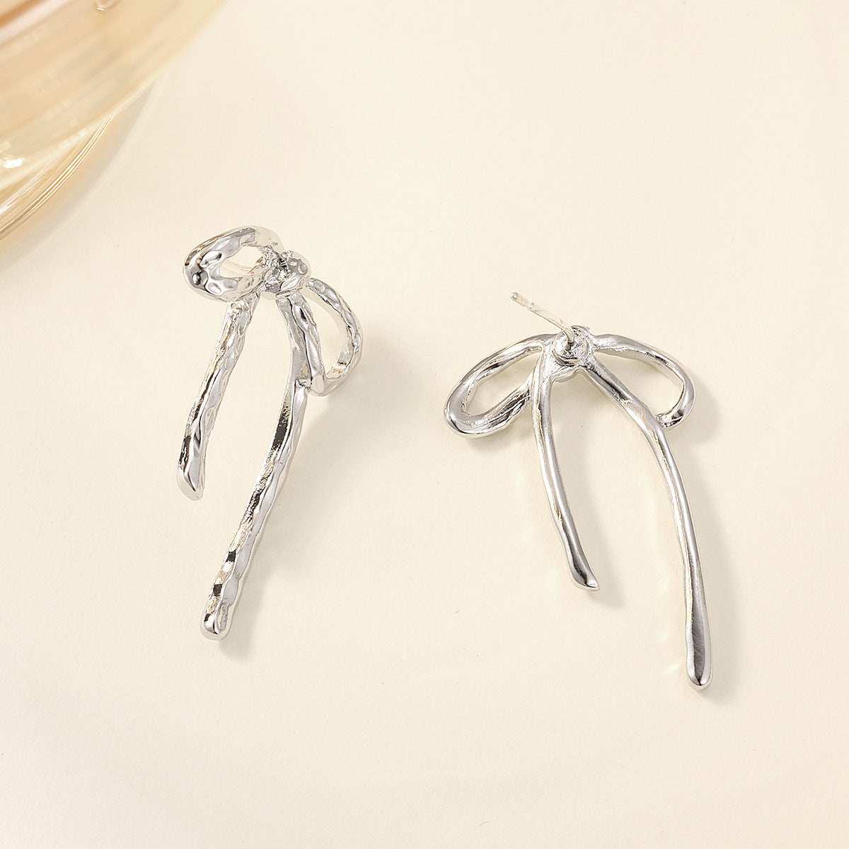 Women's Irregular Metal Bow Design Sense Niche Earrings