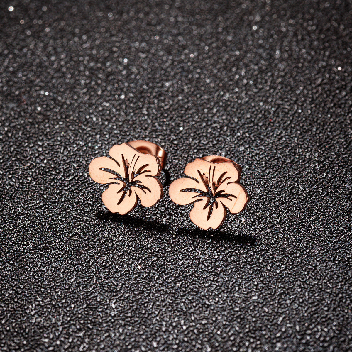 Steel Hollow Flower French Minority Retro Earrings