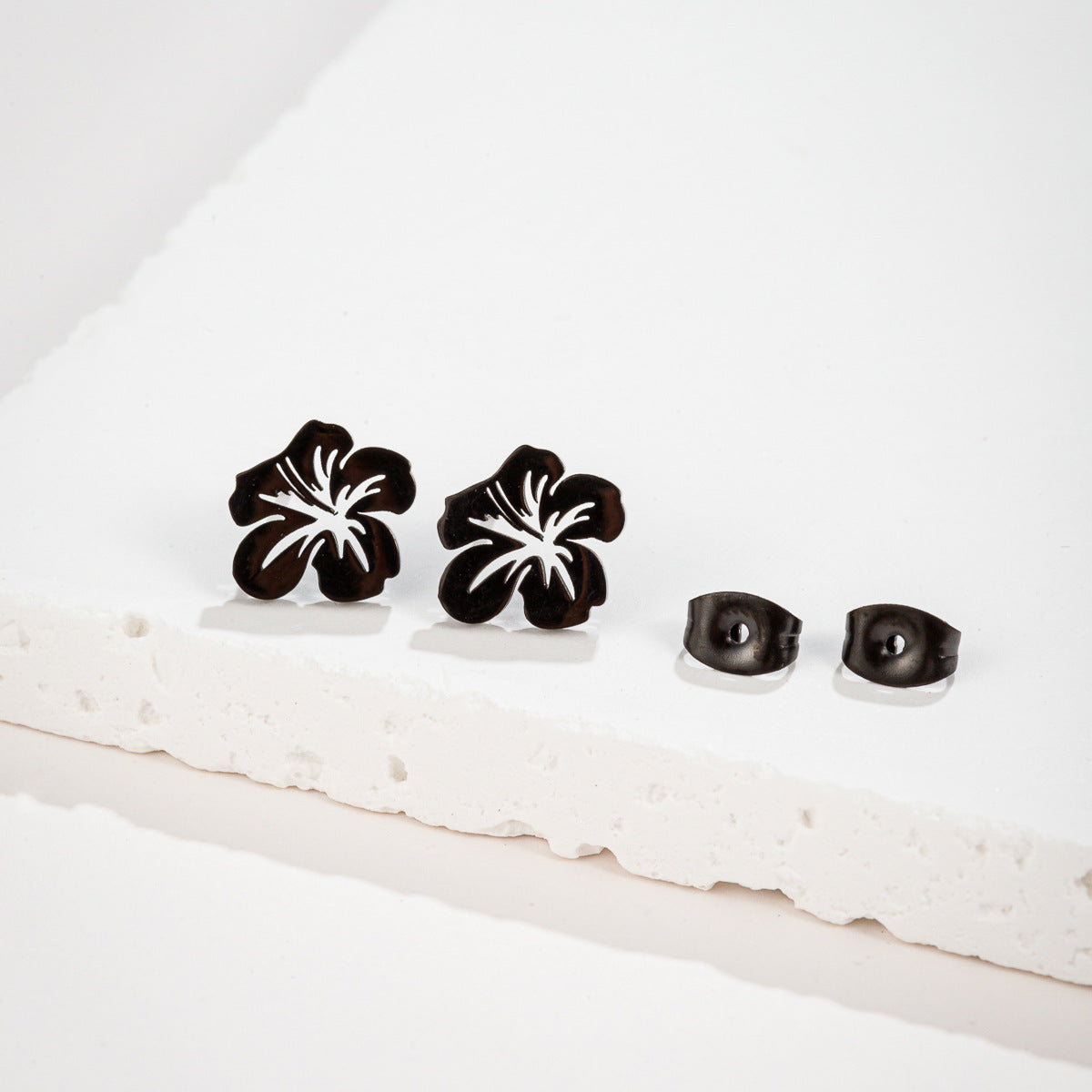 Steel Hollow Flower French Minority Retro Earrings