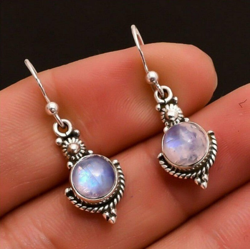 Blue Topaz Female Creative Rotational Water Earrings