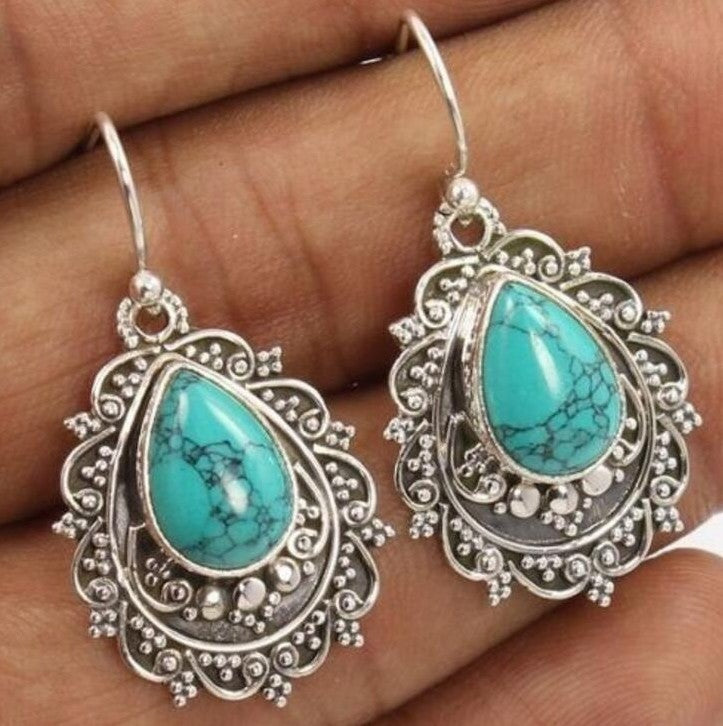 Blue Topaz Female Creative Rotational Water Earrings