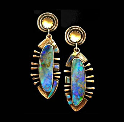 Blue Topaz Female Creative Rotational Water Earrings