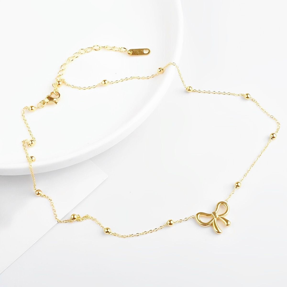Women's Titanium Steel Design Cute Hollow Bow For Necklaces