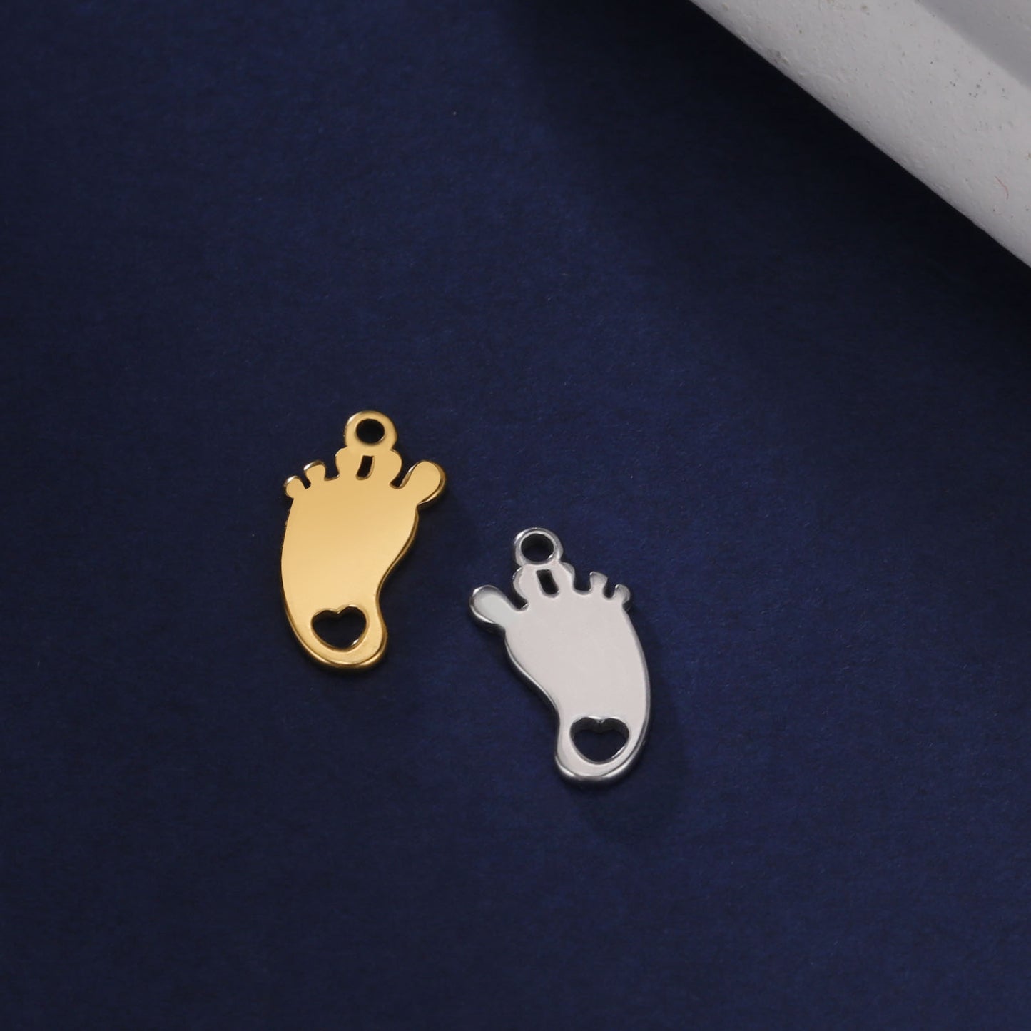 Stylish Simple Personality Titanium Steel Cut Hollow Heart Foot Pendants