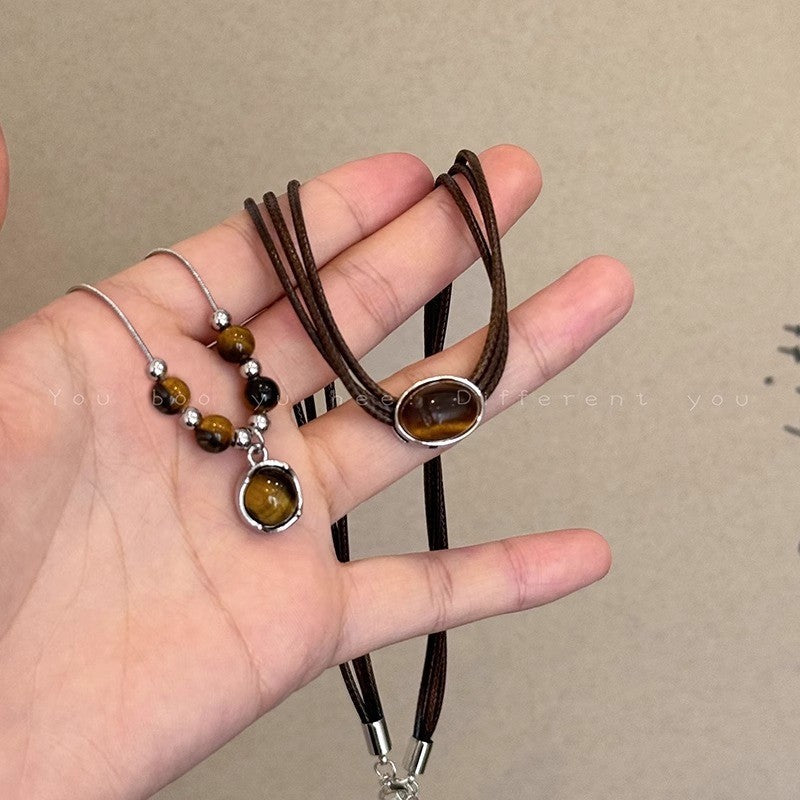 Women's Style Leather Tiger Eye Simple Sweater Chain Necklaces